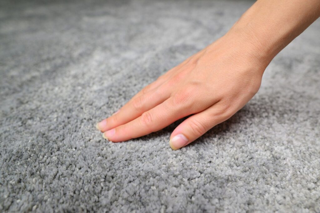 close up hand touching soft carpet gentle fluffy carpet fingers 234039 613 close up hand touching soft carpet gentle fluffy carpet fingers 234039 613